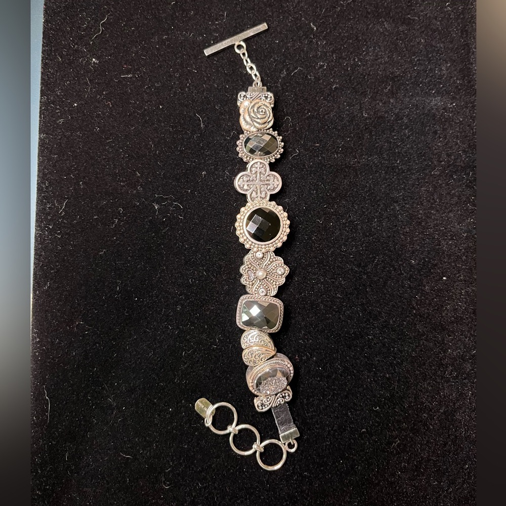 Lori Bonn bracelet with sterling silver charms- 9 charms